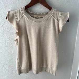 T. La Sleeveless Ruffle Sweatshirt from Anthropologie